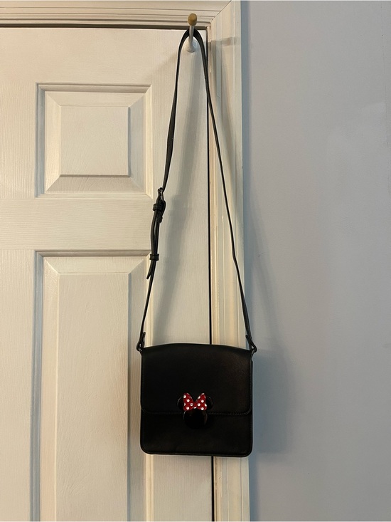 Disney Handbags - Disney Black Crossbody Bag with Mini Mouse polka dot hardware accent